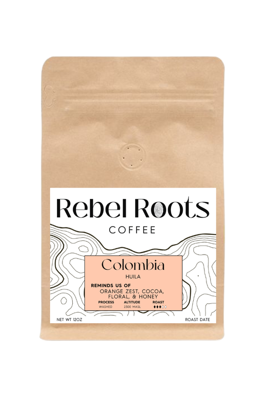 Rebel Roots Coffee bag with a white label on a beige background